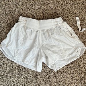 Lululemon hottie hot shorts Size 2 tall white with nude briefs